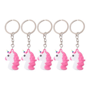 a group of pink unicorn keychains